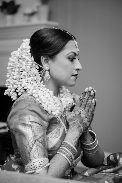 A bridal portrait during a Puja ceremony prior to her Southeast Asian wedding, captured by Nathan Sottung Photography in collaboration with Paperboys