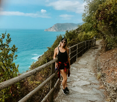 woman hiking near the ocean