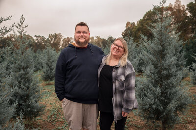 High School Senior, Couples, and Family Photographer enjoying the outdoors with her spouse at the Wheeler Christmas Tree Farm in Tunnel Hill, GA