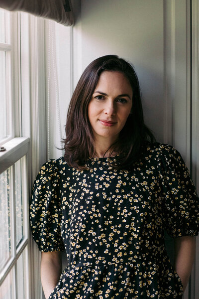 author portrait of daisy florin by the window in ct