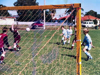 Newcastle & Hunter Valley wedding photographer Zac Graham when he was a child playing soccer