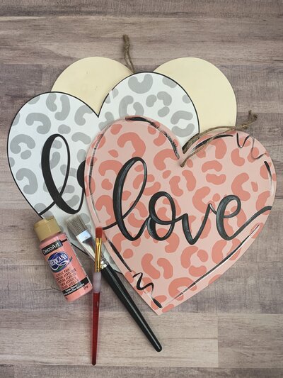 pink and red leopard print  wooden door hanger heart with black hand lettered love