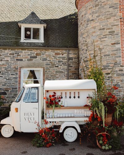 Flower truck outside beautiful event venue
