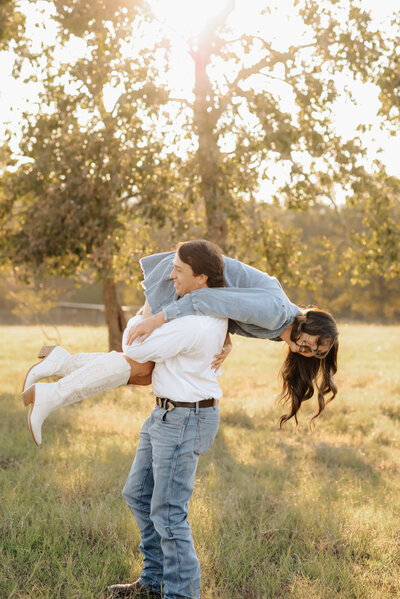 Couple playing during their engagement session in Longview, TX