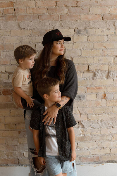 Paige Rini with her family during an in-home session in Michigan

