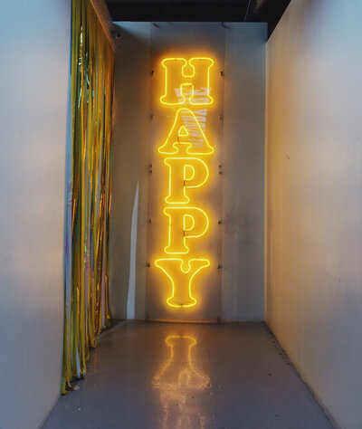 Neon yellow happy sign