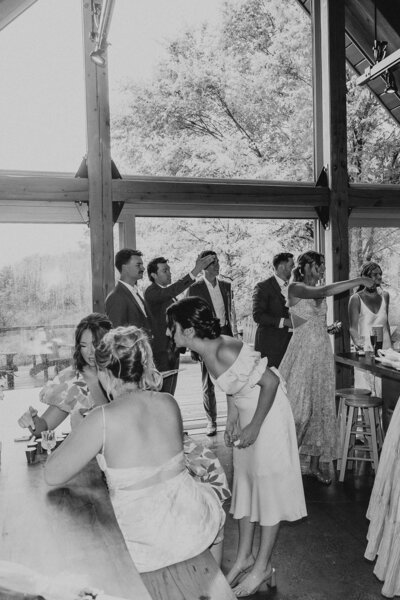 wedding party candid moment in black and white