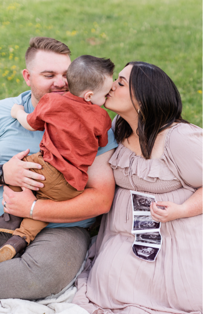 growing family takes pictures together with st george maternity photographer