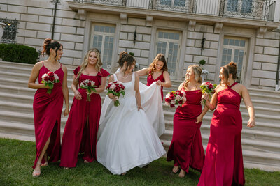 bride and bridesmaids walking down steps at War Memorial wedding 