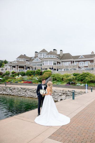 chic bride and groom walking