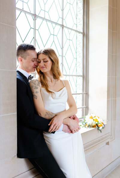 Couples by the window side 