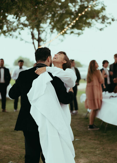 Laughing couple in Wyoming captured by Wyoming wedding photographer.