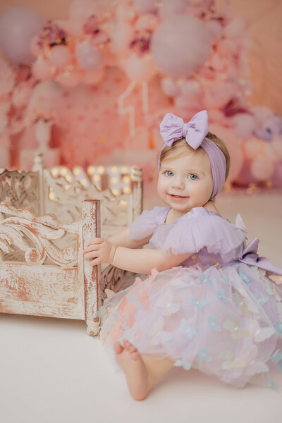 baby eating cake