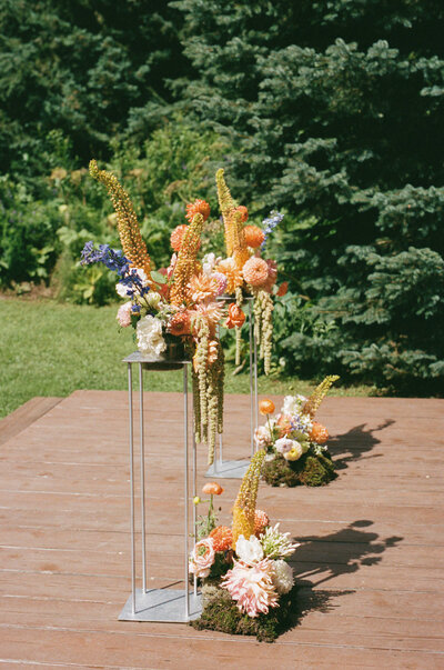 real wedding at Island Lake Lodge in Fernie, BC floral ceremony arch piece photo