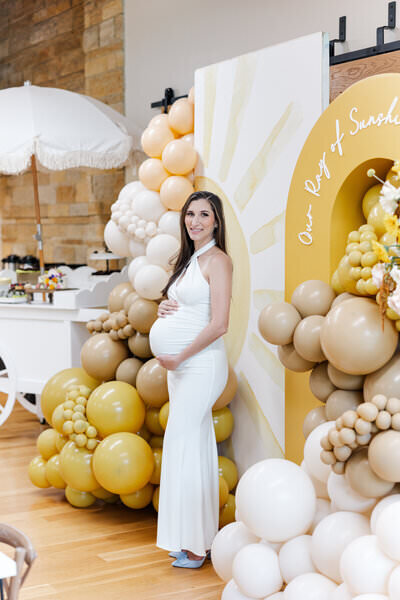 expecting mom at her bridal shower taken by photographers in minnesota