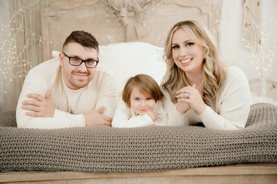 Super sweet snuggly family and newborn portraits Princeton Minnesota