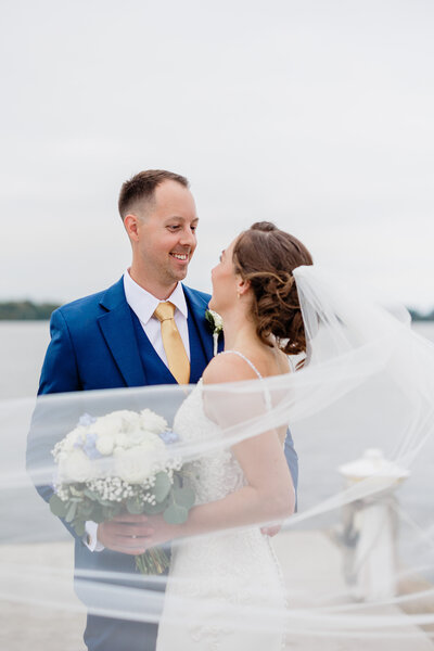 maryland havre de grace wedding photography bride groom looking at each other veil blowing in wind