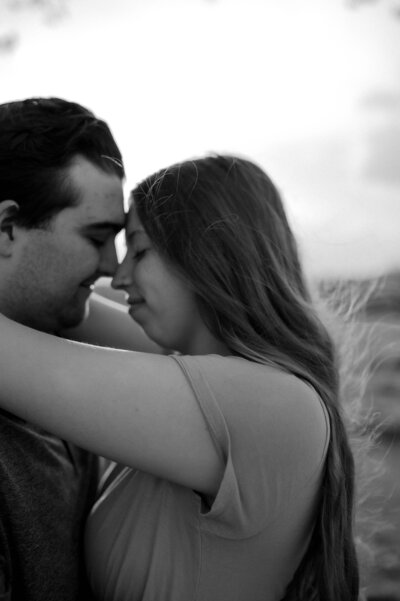 couple intimate moment touching foreheads eyes closed outdoor session