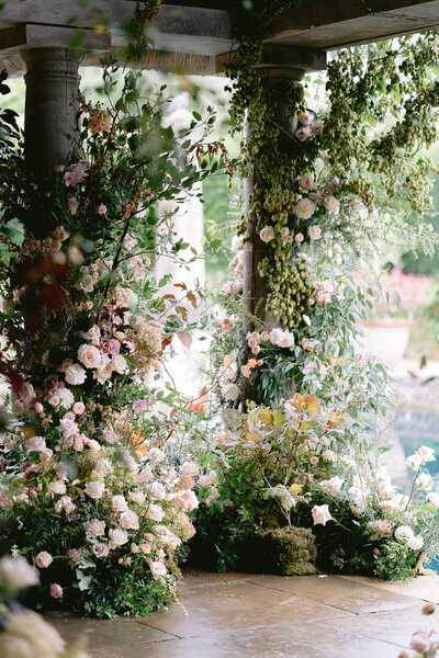 A luxury floral installation for a Euridge Manor wedding ceremony