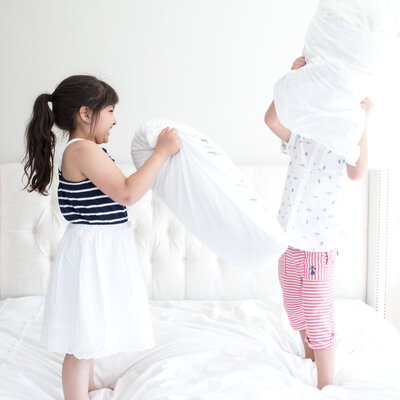 Kids having pillow fight