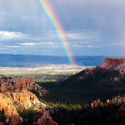 rainbow over a desert canyon scene