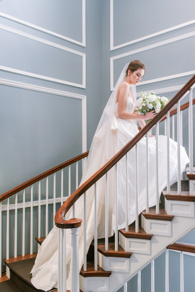 Bride and groom walk up memorial steps at their DC wedding