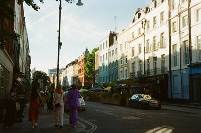 People walking down London street