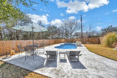 Private pool of this three-bedroom, two-bathroom vacation rental lake house that sleeps eight just steps away from Stillhouse Hollow Lake in Belton, TX.