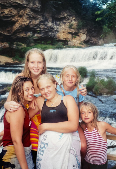 five girls by waterfalls