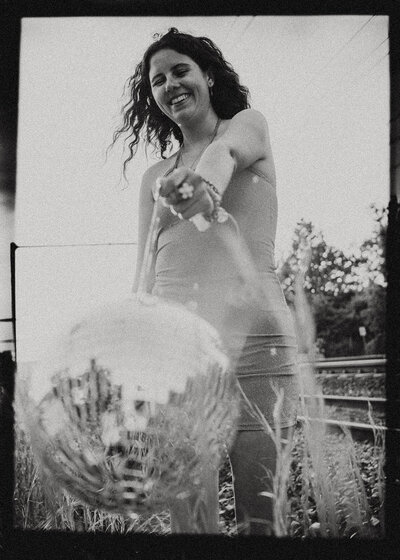 Professional headshot portrait of woman with disco ball in connecticut by Sara McIngvale Photography