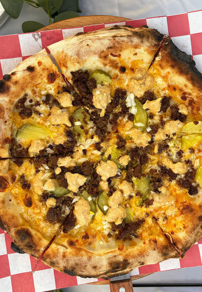 big mac style neapolitan pizza for a catering event