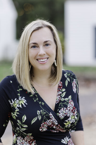 Headshot of photographer in the beautiful Colonial Williamsburg during the fall