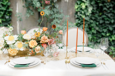 Beautiful wedding reception table with lush floral designs