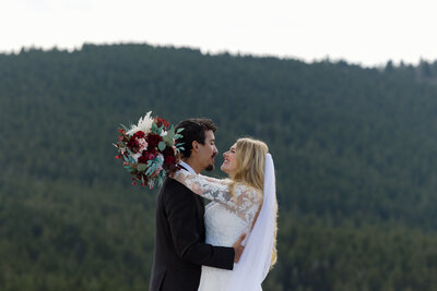 Couple reading vows during winter elopement on the Blue Ridge Parkway