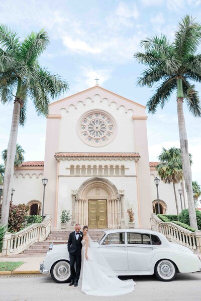 Four Seasons Orlando wedding couple at their wedding reception table outside. 