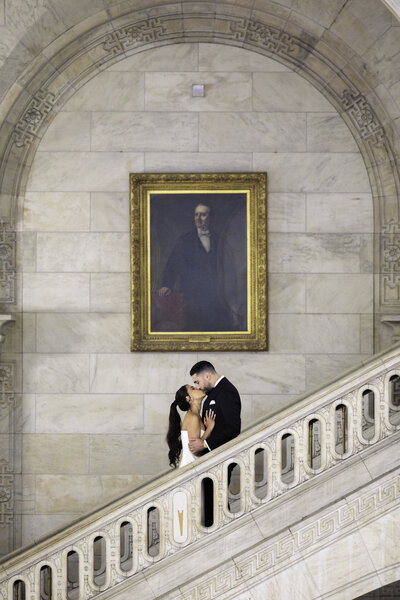 Bride and groom holding hands at Scarborough Bluffs