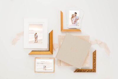 Samples of frame corners and albums from a san francisco maternity session. Prints show husband and pregnant wife on the beach together