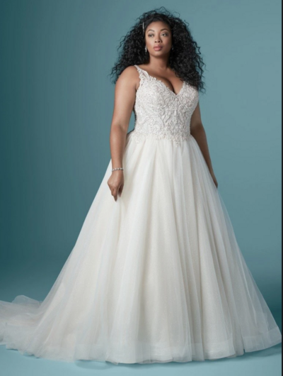 Plus Size Ball Gown Wedding Dress. This beaded bodice is designed to support and enhance your gorgeous hourglass figure. Try on this plus-size sparkling ball gown wedding dress for major fit and flattery.