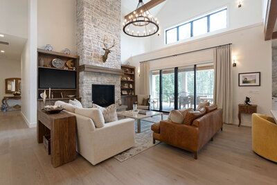 Cozy, neutral great room of Mica View Estates new construction project designed by Coeur d'Alene interior designer Sarro Design.