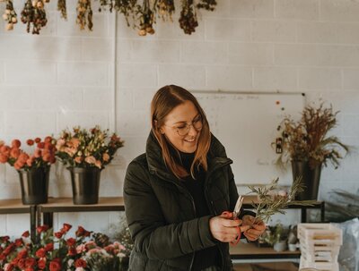 Kelly working on beautiful florals in her Scottish Borders studio