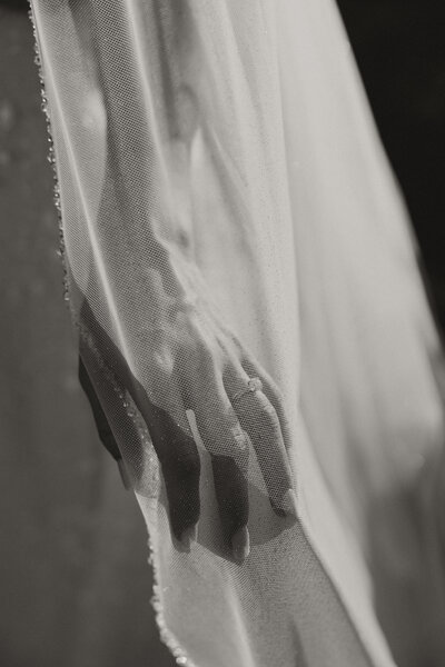 bride hand holding veil