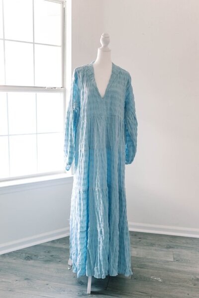 Women's blue long sleeve dress.
