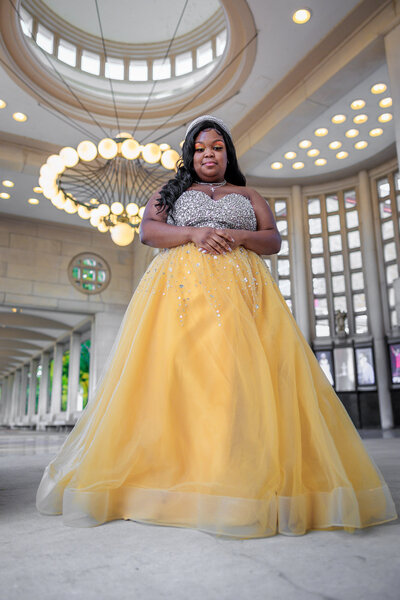 Arissa framed under the chandelier at the muny in forest park