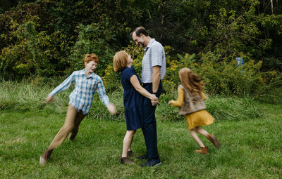 Family running and laughing