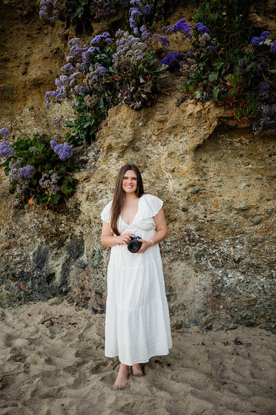 photographer posed on the beach