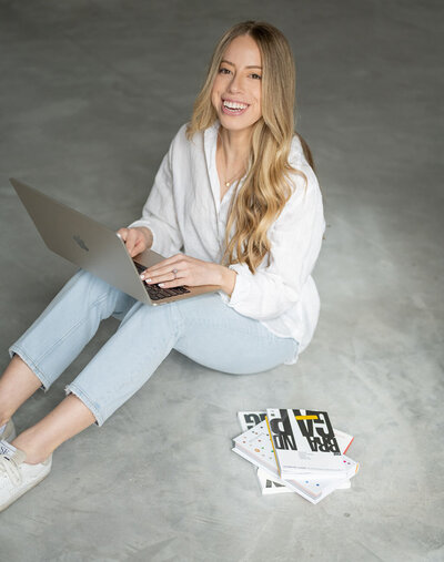 Emma smiling with white shirt