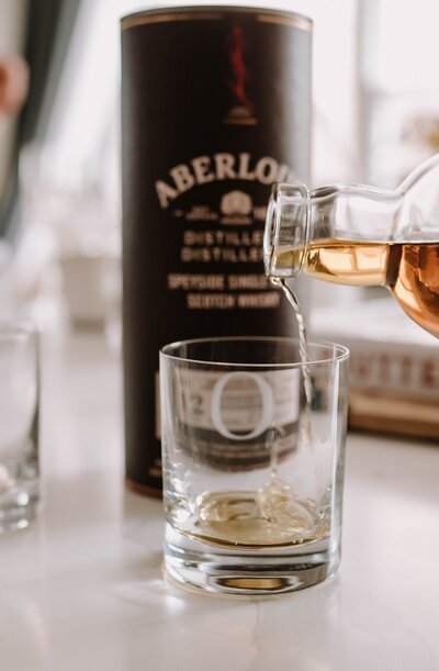 Pouring whisky on wedding day