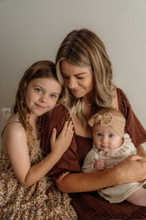 Image of Kaz, Perth Family and Newborn photographer, and her two children. 
