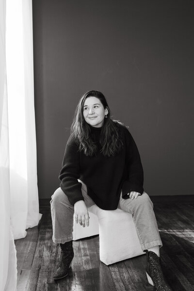 jennifer kahl holds a cup of coffee