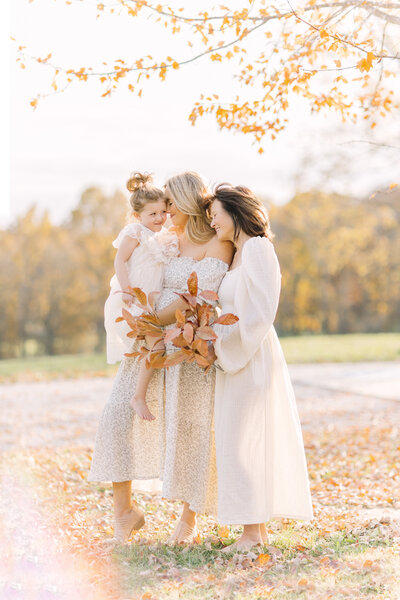 Fall family photos in Kansas City with a mom, daughter, and grandmother
